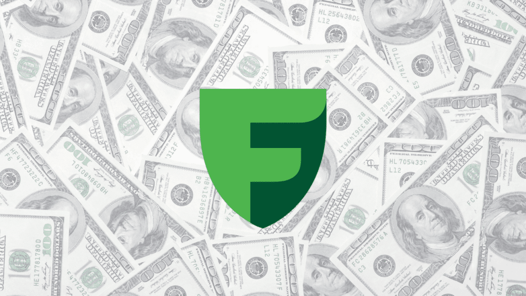 Freedom Holding Corp logo overlay on a background of US hundred-dollar bills, representing the financial success and billionaire status of CEO Timur Turlov.