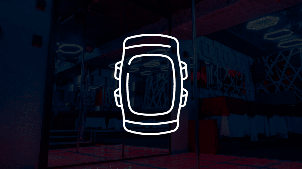 A white line-art icon of a protective athletic knee pad centered over a dark pole fitness studio background, highlighting knee pads for pole dancing for men what to look for.