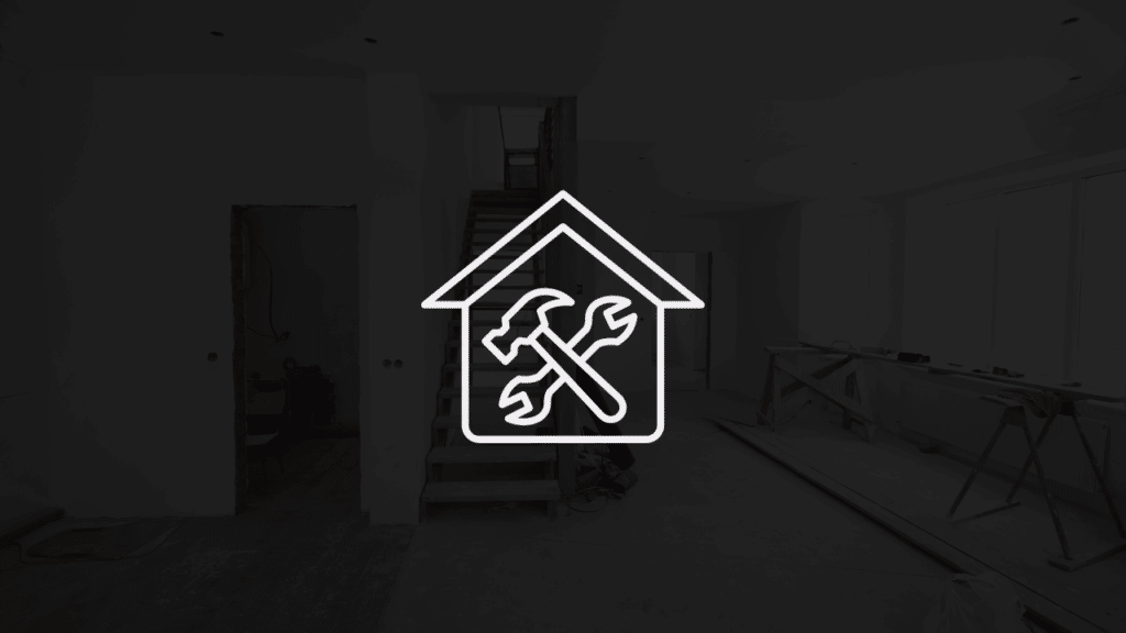 A dark, minimalist interior photograph of a residential house under construction overlaid with a white vector icon of a house containing crossed tools, representing a guide on how to market a home renovation business: the definitive local growth strategy.